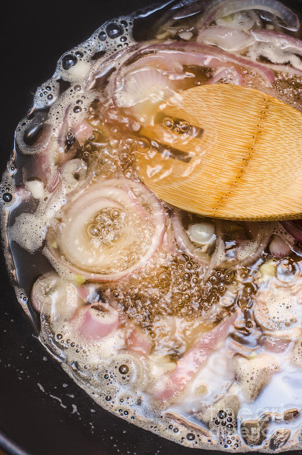 Onion Photograph - Fried red onions cooking in pan by Jorgo Photography