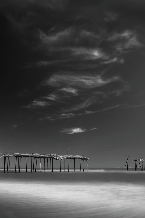 Frisco Pier in North Carolina and Clouds in Black and White Photograph by Ranjay Mitra