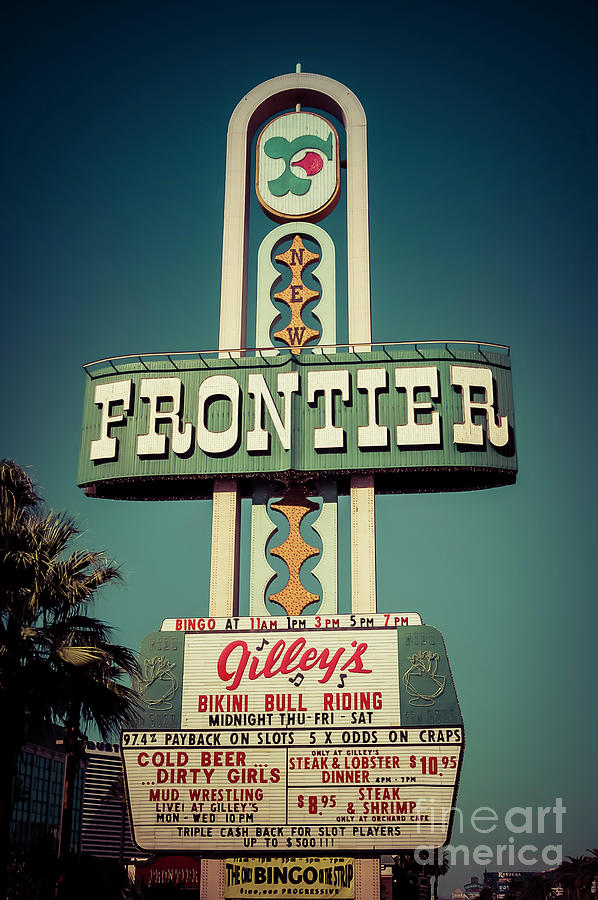 Frontier Hotel Sign, Las Vegas Photograph by Paul Warburton
