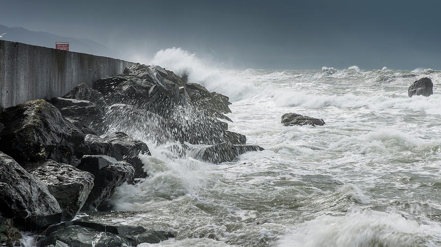 Frothy Seas Along the Jetty Photograph by Greg Nyquist