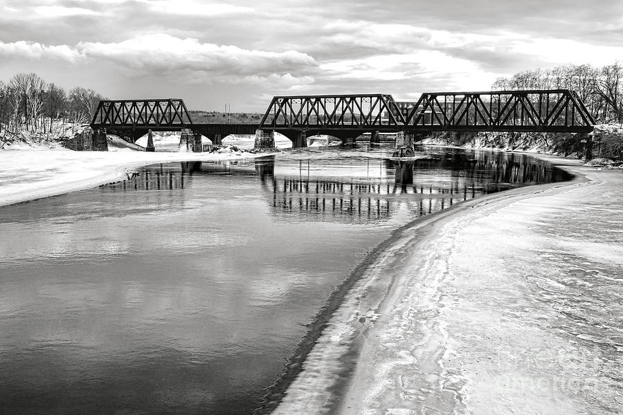 Winter Photograph - Frozen Kennebec River and Railroad Bridge in Waterville by Olivier Le Queinec