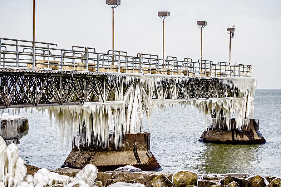 Frozen Pier On Lake Erie In Cleveland Ohio Photograph by Alex Grichenko