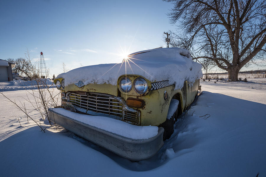 Winter Photograph - Frozen Taxi by Aaron J Groen
