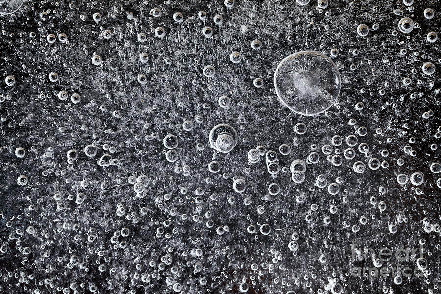 Frozen water background with black below Photograph by Simon Bratt