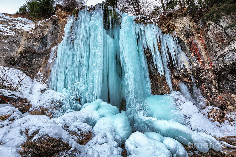 Frozen waterfall in the winter Photograph by Ragnar Lothbrok