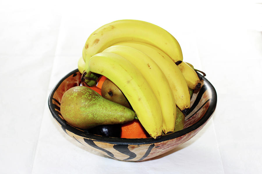 Fruit in a wooden bowl Photograph by Tom Conway