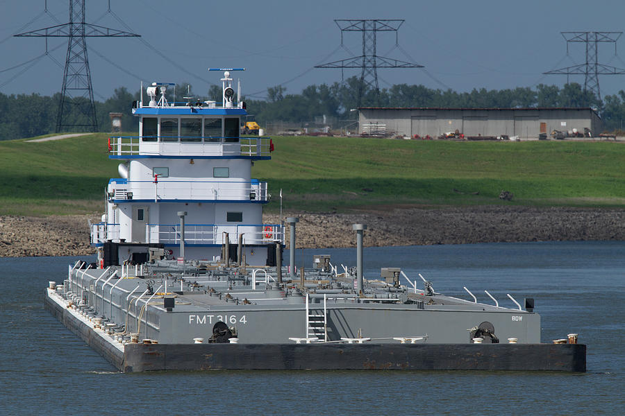 Fuel barge on the Mississippi R Photograph by Garry McMichael