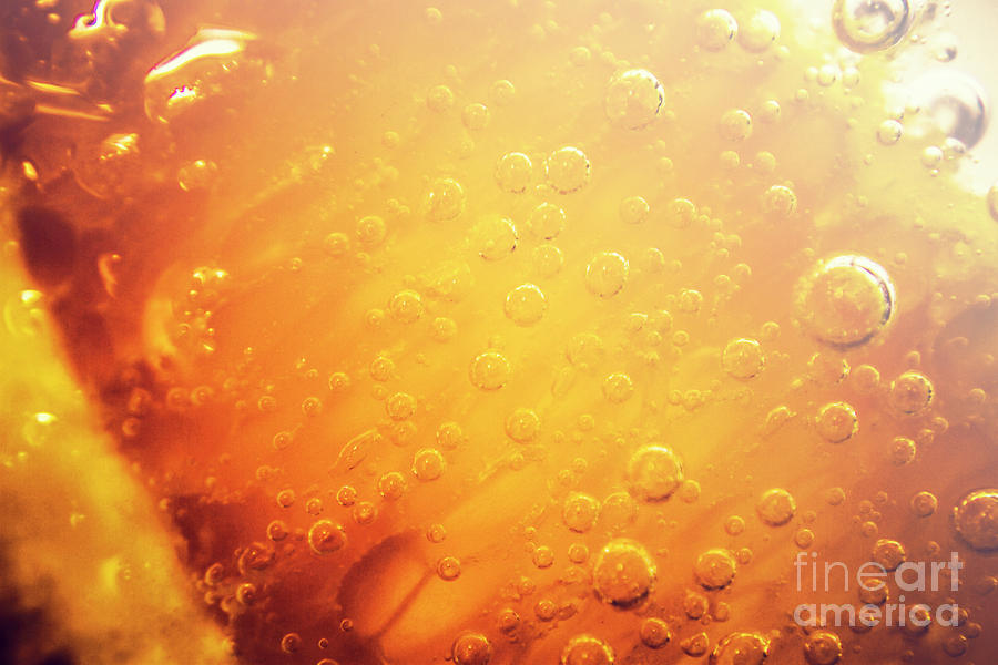 Full frame close up of orange soda water Photograph by Jorgo Photography
