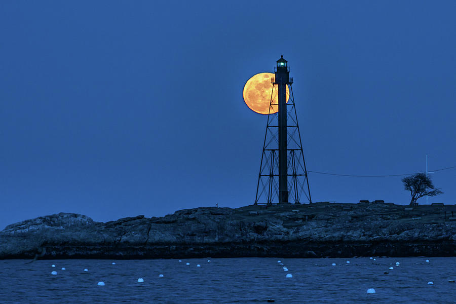 Full moon above Marblehead Light Photograph by Jeff Folger
