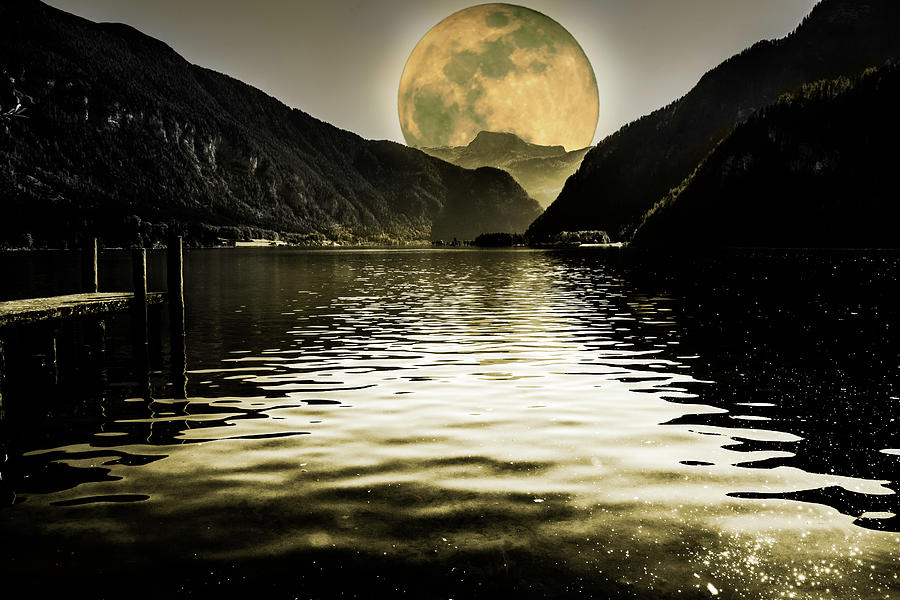 Full moon over Hallstaettersee Photograph by Wolfgang Stocker