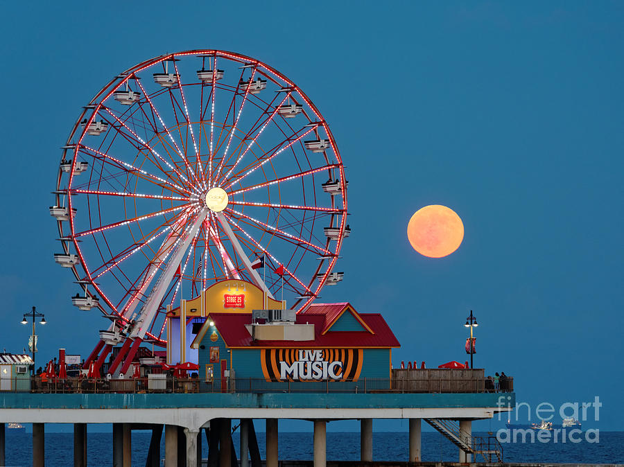 Full Moon rising above the Gulf of Mexico - Historic Pleasure Pier - Galveston Island Texas Photograph by Silvio Ligutti