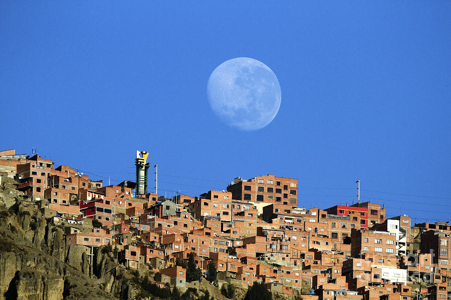 Full moon setting over El Alto Bolivia Photograph by James Brunker