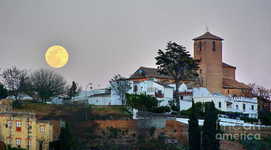 Architecture Photograph - Full Moon sunrise. San Cristobal church.1501 .Spain by Guido Montanes Castillo