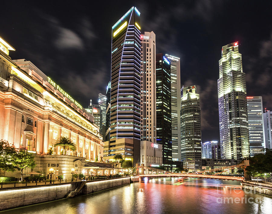 Fullerton hotel and financial district in Singapore Photograph by Didier Marti