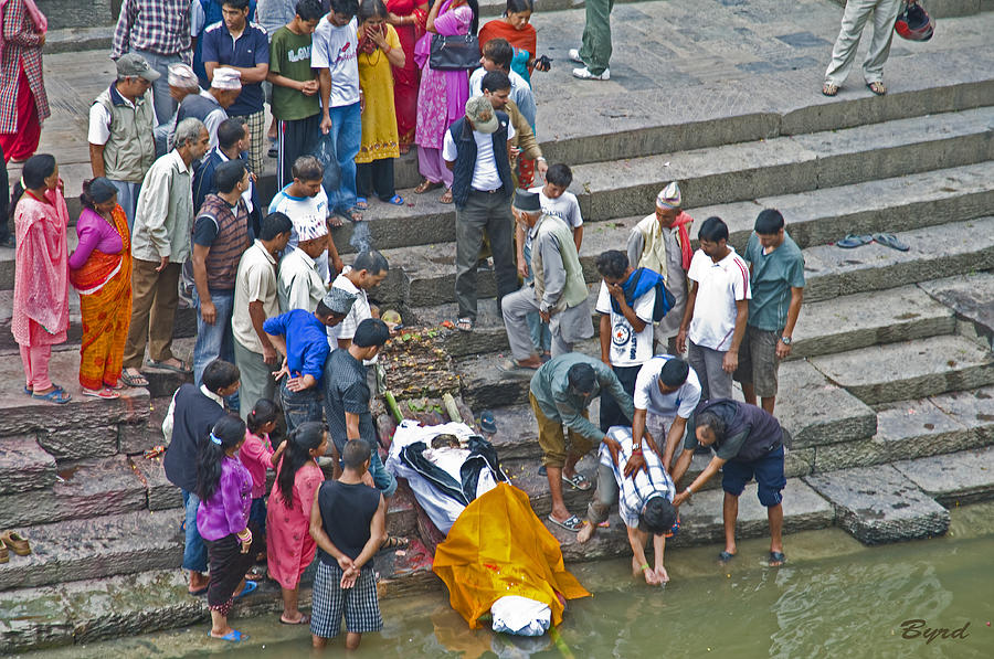 Funeral cleansing at Bhaktapur ghat in Nepal Photograph by Christopher Byrd