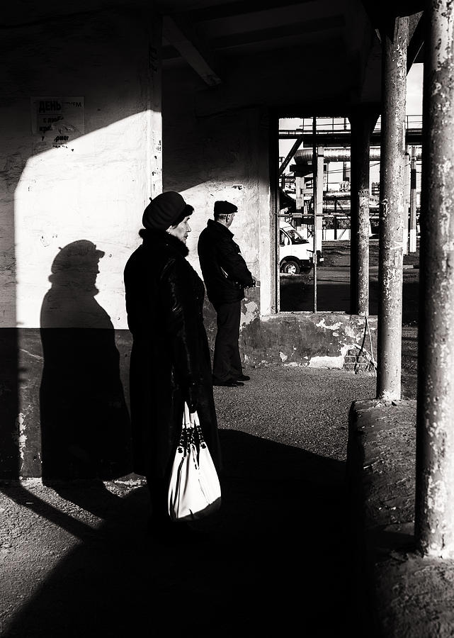 Fur Hat Woman Waiting at Bus Stop Photograph by John Williams