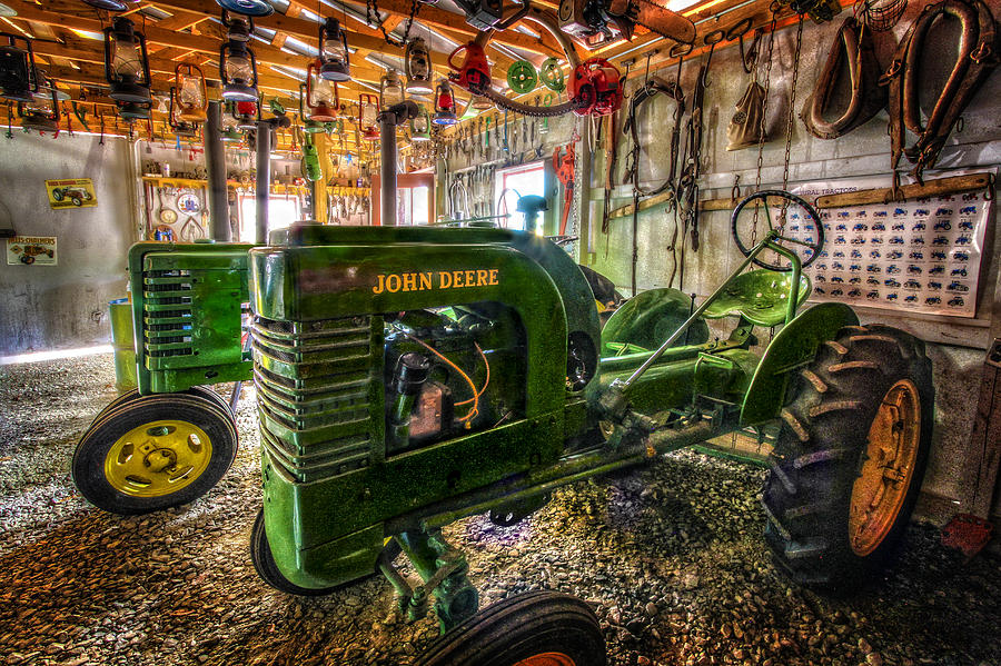 Barn Photograph - Garage Full of Deere by Debra and Dave Vanderlaan