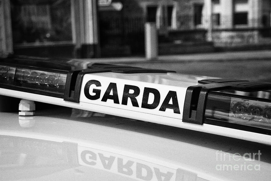 Car Photograph - Garda Irish Police Patrol Car Sligo Republic Of Ireland by Joe Fox