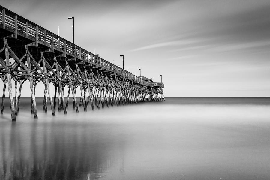Black And White Photograph - Garden City Pier BW II by Ivo Kerssemakers
