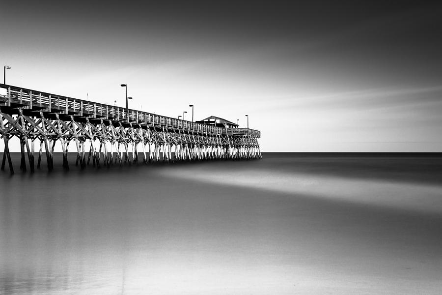 Black And White Photograph - Garden City Pier BW III by Ivo Kerssemakers