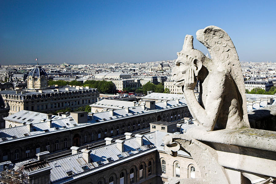 Gargoyle Guarding The Notre Dame Basilica In Paris Photograph