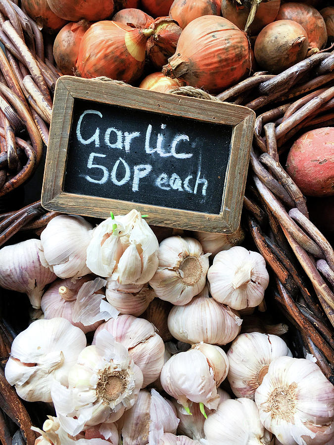 Garlic sale Photograph by Tom Gowanlock