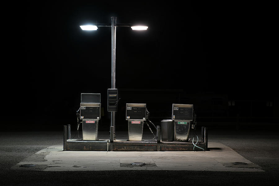 Gas Pumps with Stray Cat Photograph by Bud Simpson