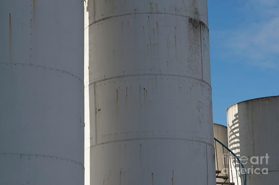 Gasoline Storage Tanks with Staircase Photograph by Jim Corwin