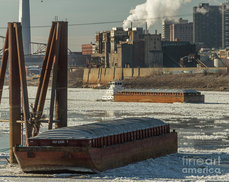 Gateway Express Woking on the icy Mississippi River Photograph by Garry McMichael