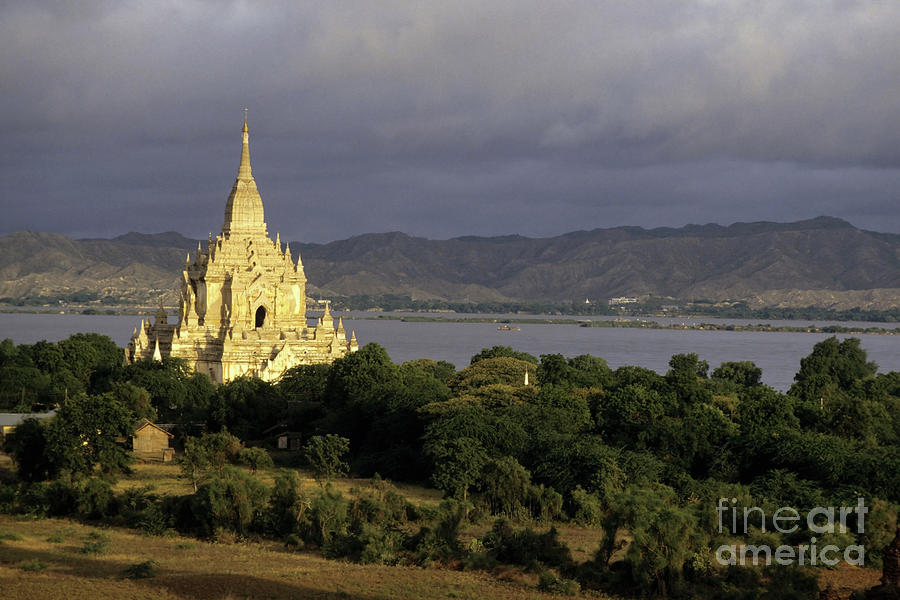 Architecture Photograph - Gawdawpalin Temple and historic pagodas at sunrise along the Irrawady River in Burma. by Sami Sarkis