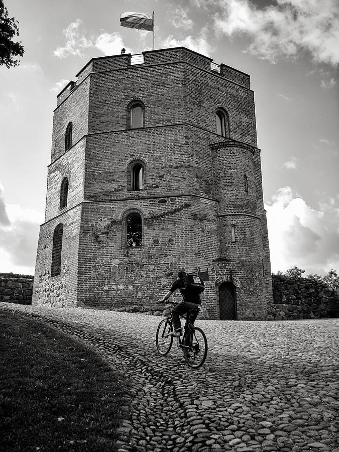 Gediminas Tower and Bicycler Lithuania Photograph by Mary Lee Dereske