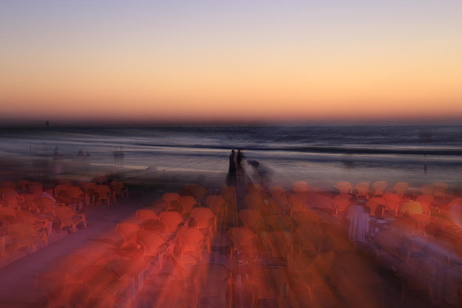 Ghost On A Beach. Photograph by Shlomo Zangilevitch
