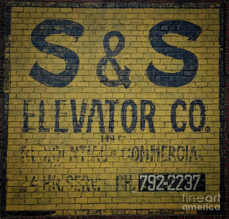 Ghost Sign Elevator Company Photograph by Janice Pariza