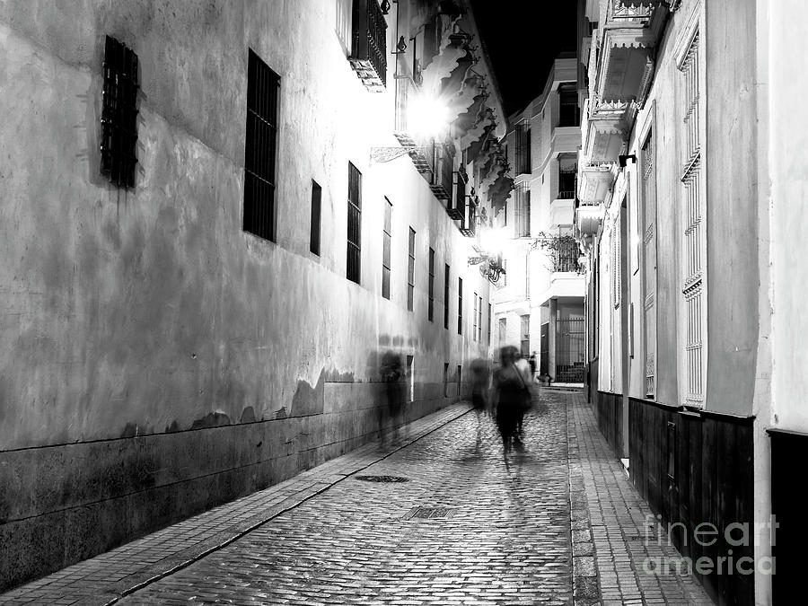 Ghosts in Seville at Night Photograph by John Rizzuto
