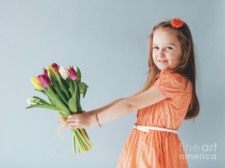 Girl Holding A Bunch Of Colorful Tulips. Photograph