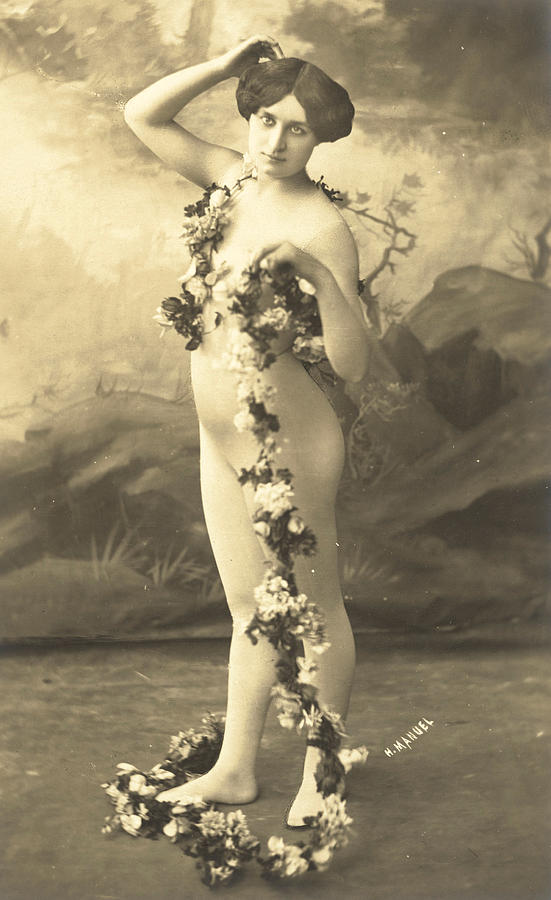 Girl in body stocking holding garland of flowers Photograph by French School