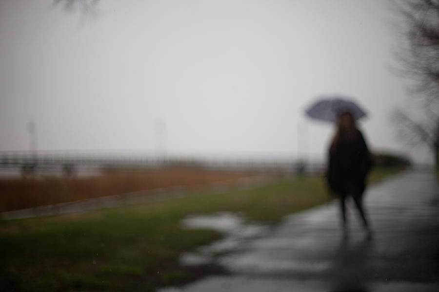 Girl In Fog And Rain With Umbrella