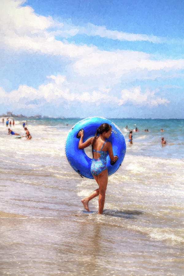 Girl On Beach With Tube Photograph by Carol Montoya