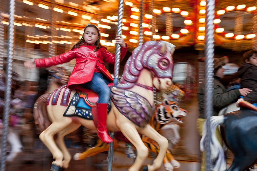 Girl on Merry Go Round Photograph by Matthew Bamberg