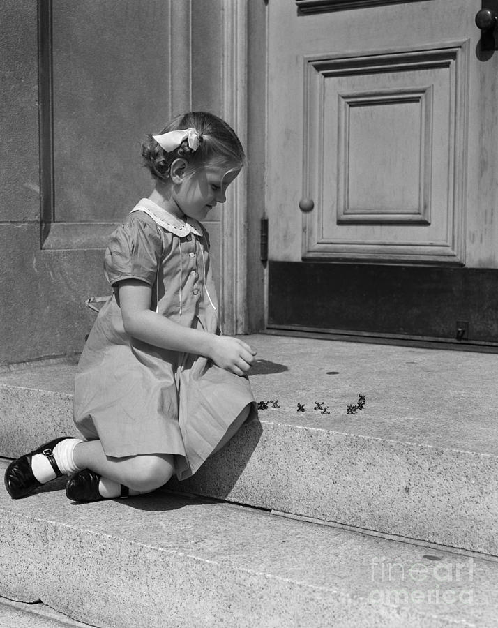 Girl Playing Jacks, C.1930-40s Photograph by H. Armstrong Roberts/ClassicStock