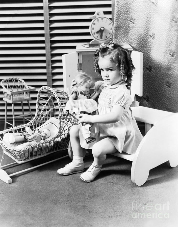 Girl Playing With Dolls, C.1930-40s Photograph by H. Armstrong Roberts/ClassicStock