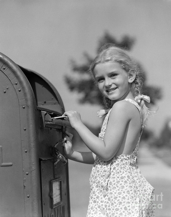 Girl Putting Letter In Mailbox Photograph by H. Armstrong Roberts/ClassicStock