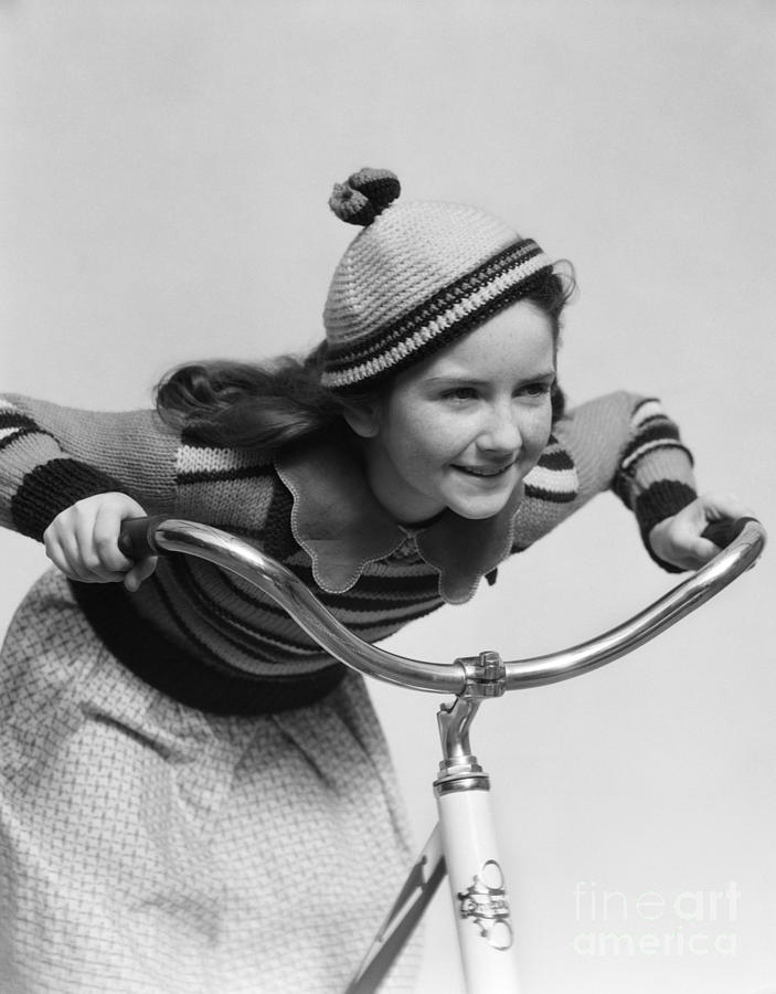 Girl Riding A Bike, C.1930s Photograph by H. Armstrong Roberts/ClassicStock