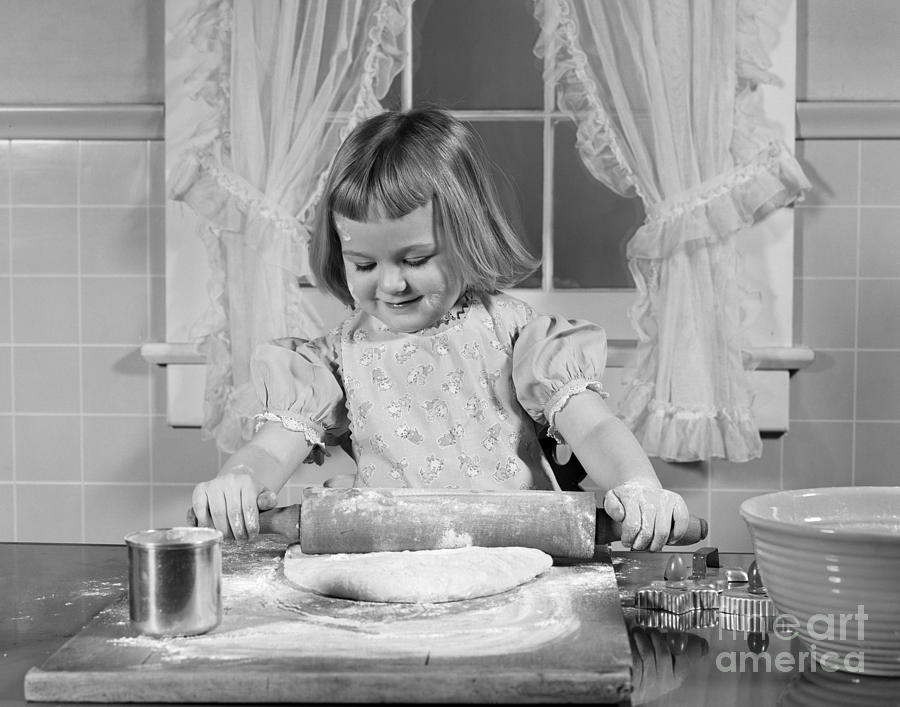 Girl Rolling Dough And Smiling, C.1950s Photograph by H. Armstrong Roberts/ClassicStock