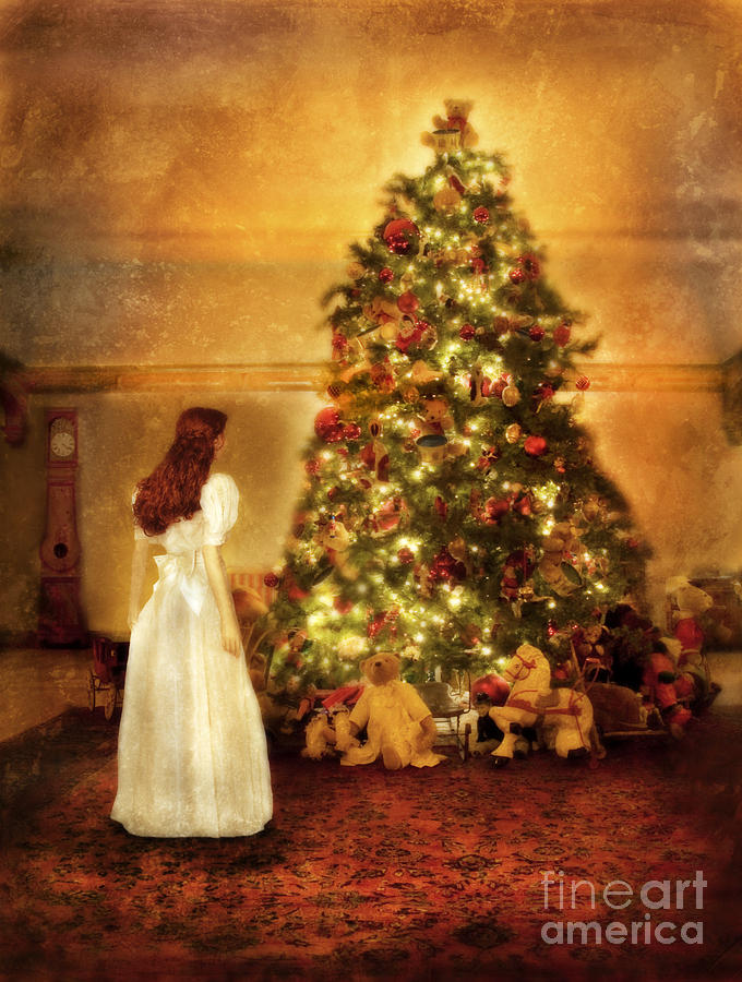 Girl Standing in Wonder by Christmas Tree Photograph by Jill Battaglia