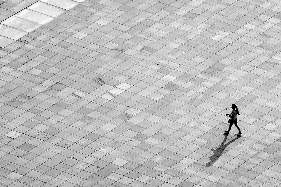 Girl Walking - Xingyi, China Photograph by Rick Shea