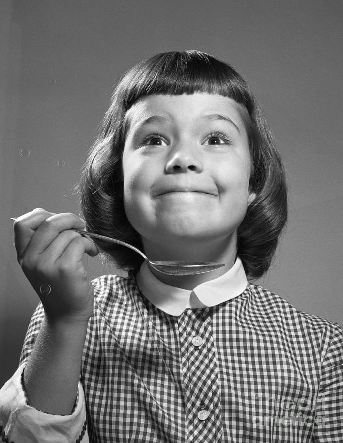 Girl With Spoon Smiling, C.1960s Photograph by Debrocke/ClassicStock