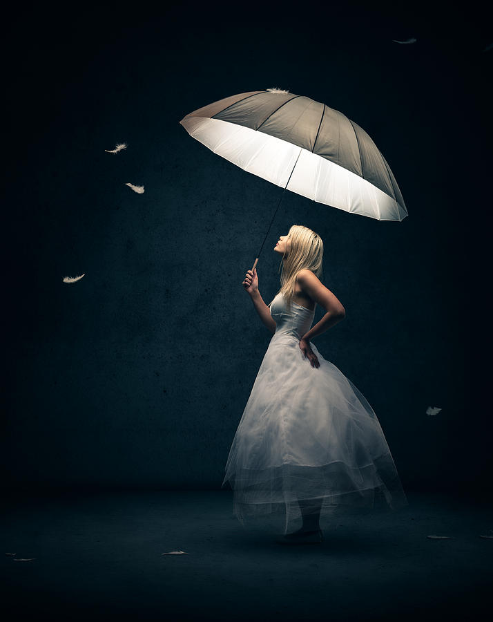 Umbrella Photograph - Girl with umbrella and falling feathers by Johan Swanepoel