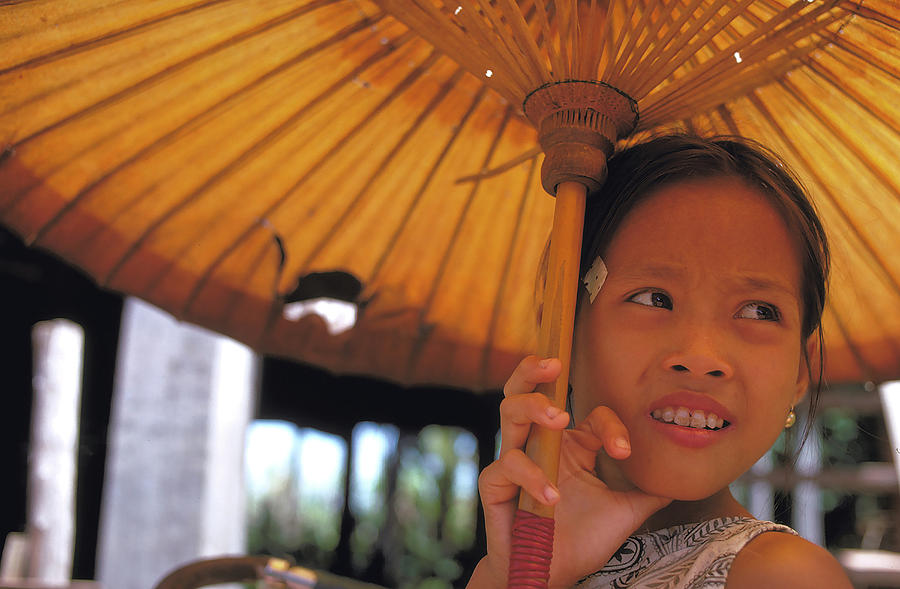 Girl With Umbrella In Laos Photograph By Carl Purcell Fine Art America