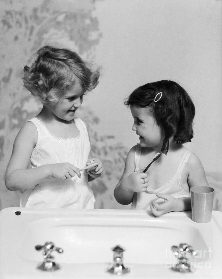 Girls At Sink With Toothbrushes, C.1930s Photograph by H. Armstrong Roberts/ClassicStock
